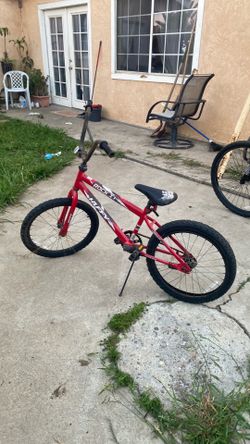 Red Huffy 20 BMX Bike
