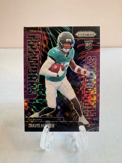 2025 Prizm - Travis Hunter #13 Fireworks Purple Power Prizm /49 (RC)