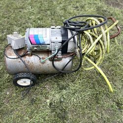Electric air compressor includes 2 air lines