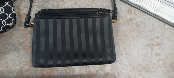 New, small black purse with multiple pockets