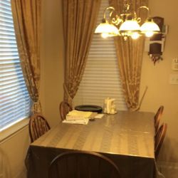 Breakfast table with five chairs