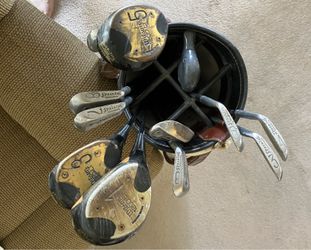 Vintage Wilson and Spaulding clubs