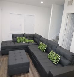 James Gray -Black - Brown Reversible Sectional / couch /Living room set