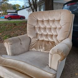 vintage-style velvet swivel armchair. 