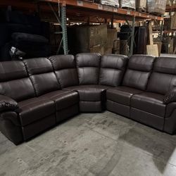 New Recliner Sectional In Faux Leather 