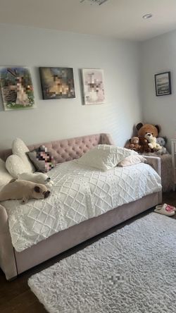 Pastel pink upholstered day bed (twin) for sale