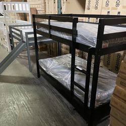 Twin bunk bed. Available in espresso, white, & grey. Bunk bed only-$220. With mattresses-$399. Assembly required. Assembly not included. Tax included.