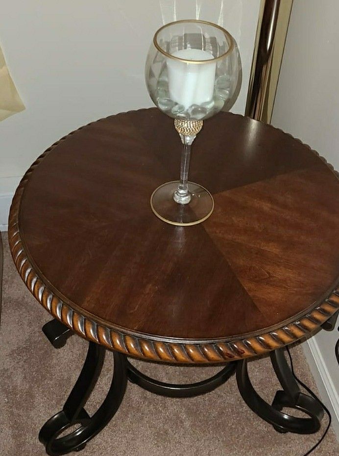 Ashley Furniture 2 small tables and the big one.