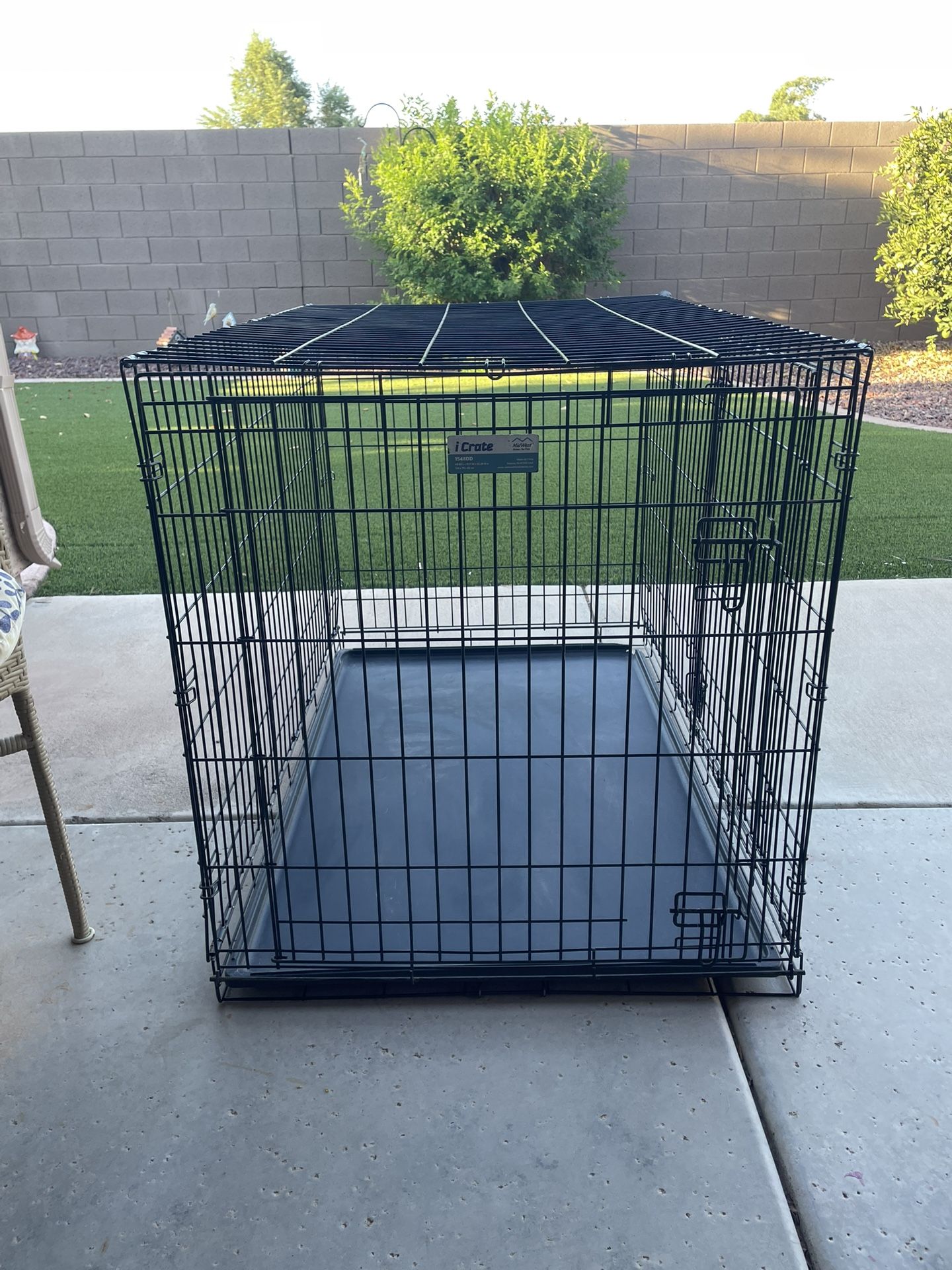 Large MidWest Homes for Pets iCrate, a double-door folding metal dog crate