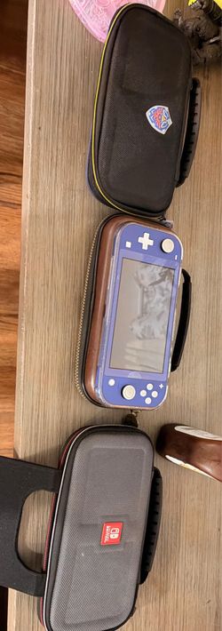 🎮 Nintendo Switch Lite Blue + Carrying Cases – Excellent Condition