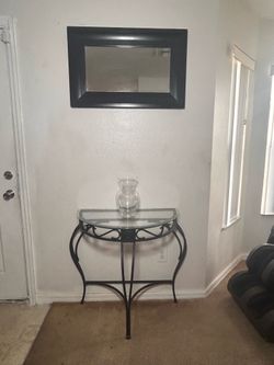 Glass top entryway table with mirror