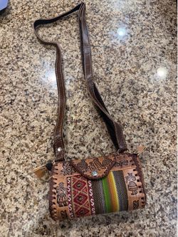 Mini hand tooled purse
