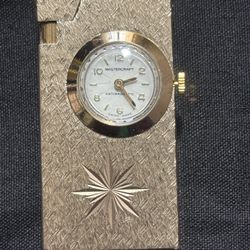 Collectible Marxman Precision Masterwork Cardinal Star Gold Tone Lighter With a Clock.