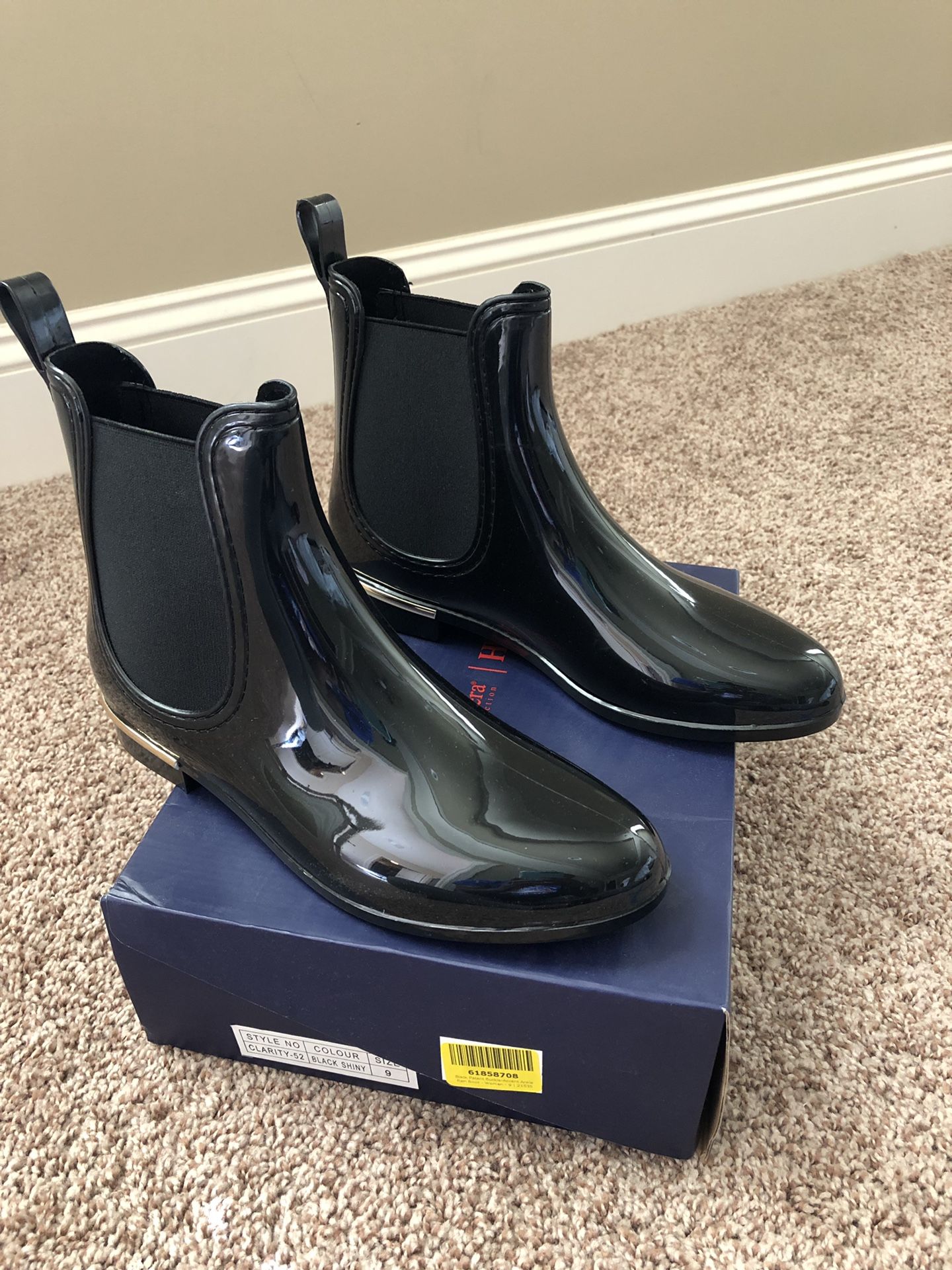 Brand new. Never worn. Rain boots. Size 9.