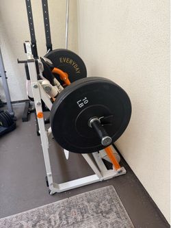 Hip thrust machine for $300 and Olympic weight set $400
