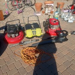 Lawnmower And Blower And Stick Saws And Just 