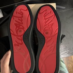 Christian Louboutin Sneakers (Red Bottoms)