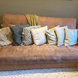 Futon couch and sleeper with storage $75