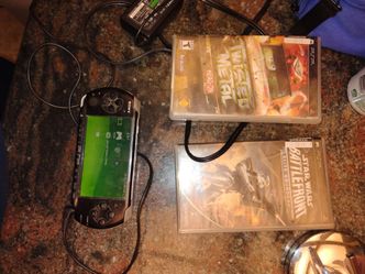 Psp with charger and 2 games