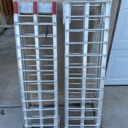 Two Aluminum Foldable Ramps 7’x10” Preowned