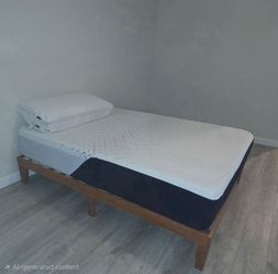 2 Nectar Beds with bamboo frame and Vari adjustable desks and a couple refrigerators.