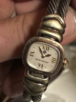 Used women’s sterling silver and 10 karat gold watch