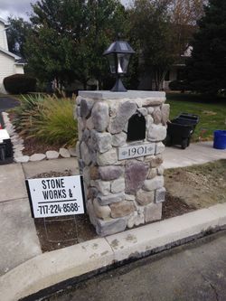 Stone pillar mailboxes, built on site