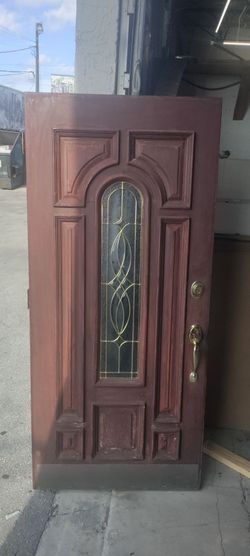 Exterior solid wood very heavy designer gold trim glass approximately 35.79 x79.25 paint peeling exterior side