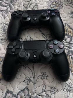 Two PS4 DualShock 4 Controllers Black