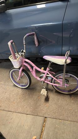 Little girls pink Schwinn bike