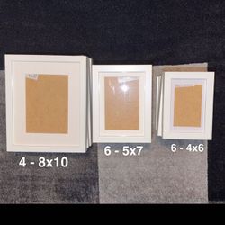 16 white pictures frames