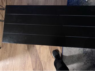 Black metal shelf unit