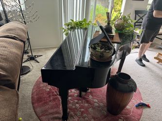 Black Baby Grand Piano. Needs repair