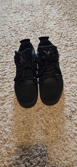 Mens US 7/ women's 9 Black Cat Jordan 4s