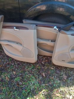 Clean Tan door Panels ,Grill Buick Lucerne