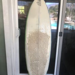 5’7 Dev surfboard