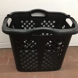 Large plastic black laundry basket in good Condition 