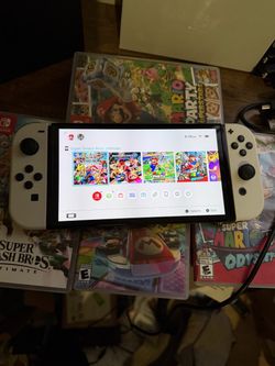 Nintendo switch oled with 7 games