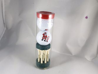 Golf balls and golf tees