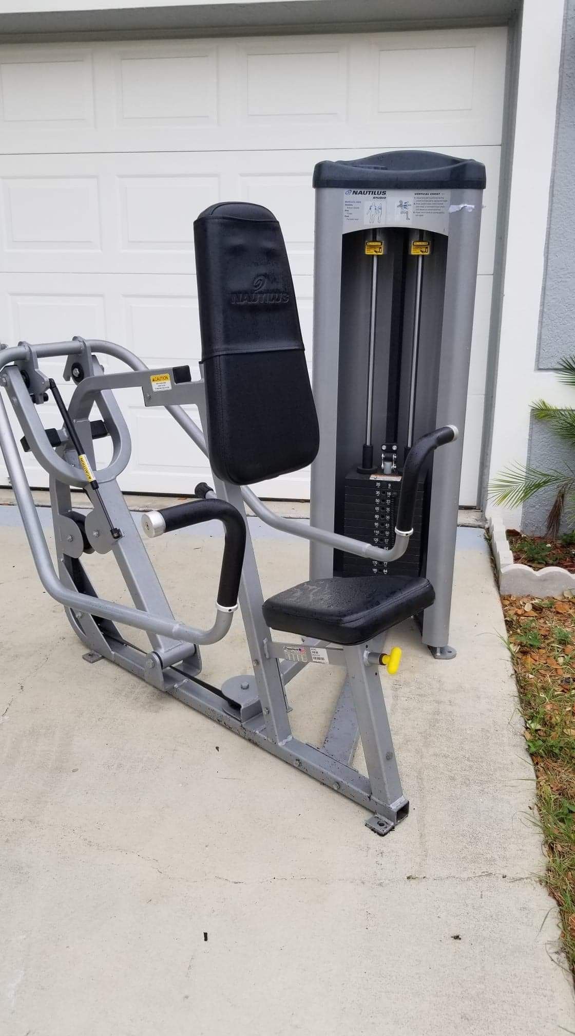 Nautilus 3 position vertical chest press machine.