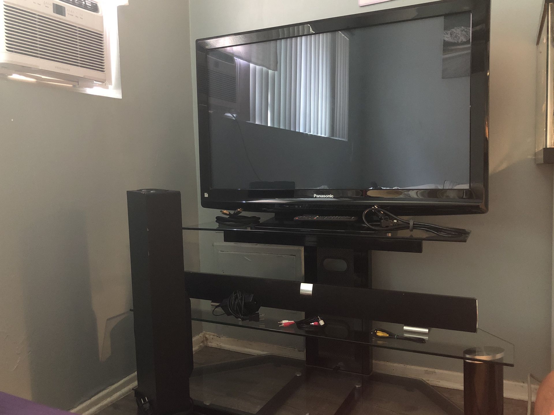 42” Panasonic Plasma HDTV, Sound Bar w/ Sub, and Glass TV Stand