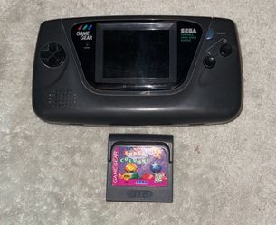 SEGA GAME GEAR HANDHELD CONSOLE WITH VIDEO GAME