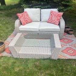 Eye Catching Outdoor Loveseat & Table w/Accent Pieces