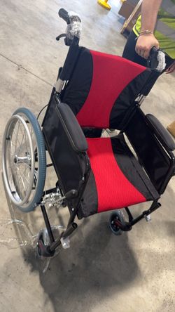 Brand New Medwarm Lightweight Folding Wheelchair