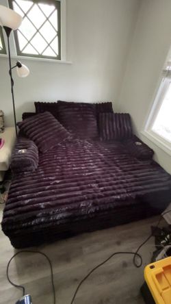Oversized black chaise lounge