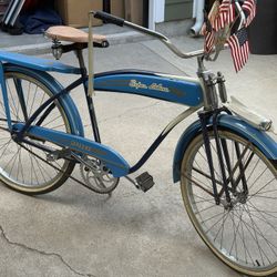 Monark mens  super deluxe-bike with tank and horn rear rack, springer fork excellent condition not sure on year thinking late 50s early 60s  but its s