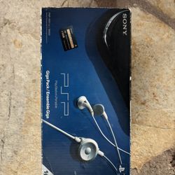 Sony PSP-1001 Giga Pack (1GB Memory Stick Duo Included)