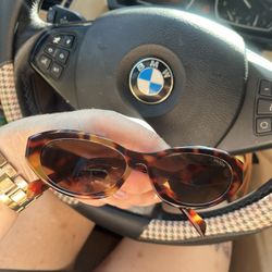 Prada Oval Tortoise Sunglasses 