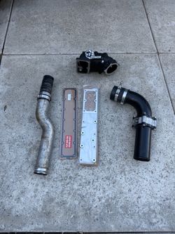 Passenger side boost tubes