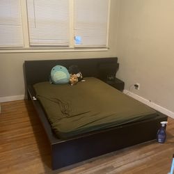 IKEA full size bed with attached night stand